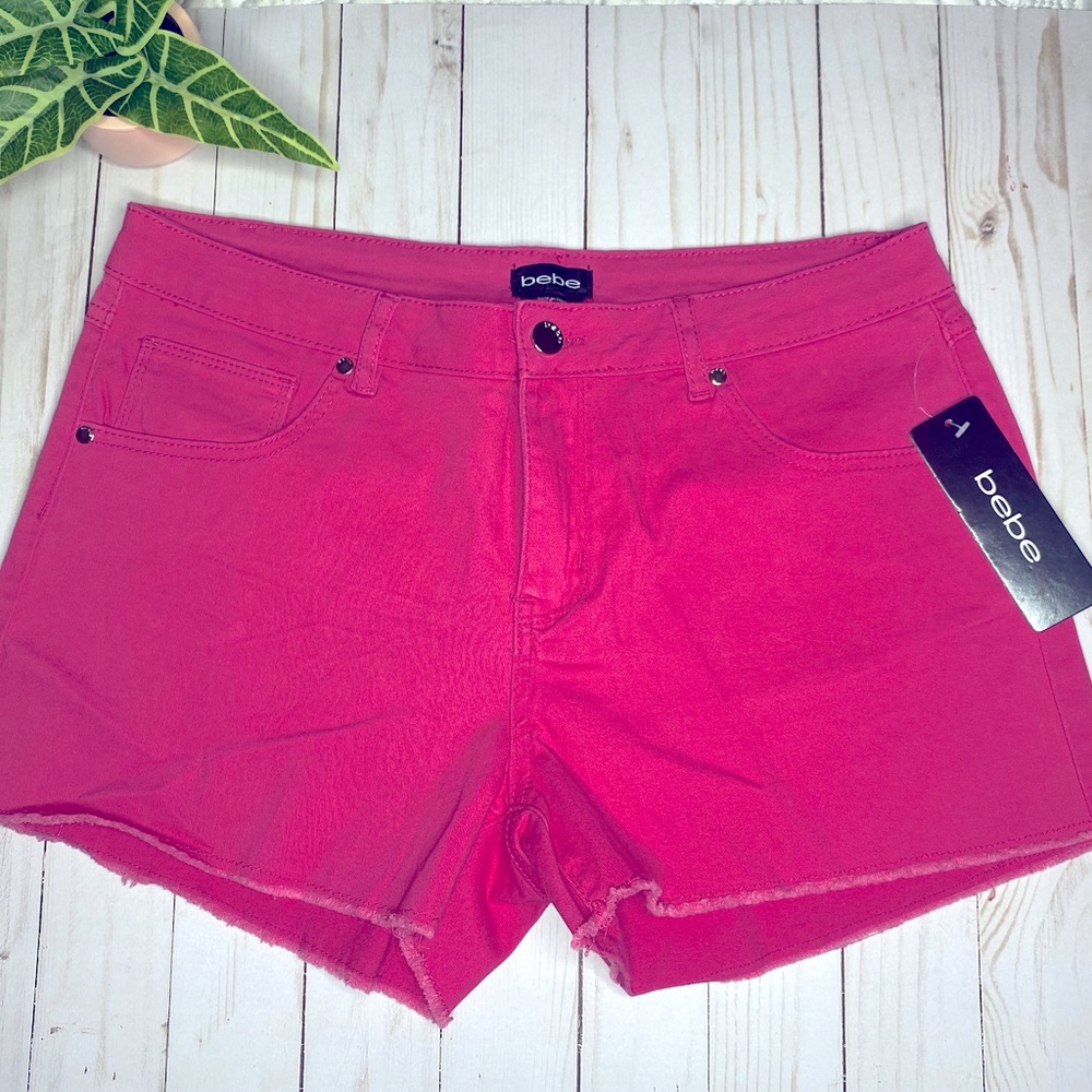 BEBE mid rise pink short